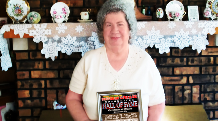 Doris E. Hays holding the Hall Of Fame Award she recently received in the post from Keith Bradford