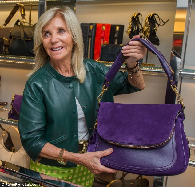 Store owner Trudie Goertz insists her sales assistant did 'everything right' and was not 'racist' to Oprah (pictured on the red carpet last night in LA) when she asked to see the $38,000 bag at the Swiss store